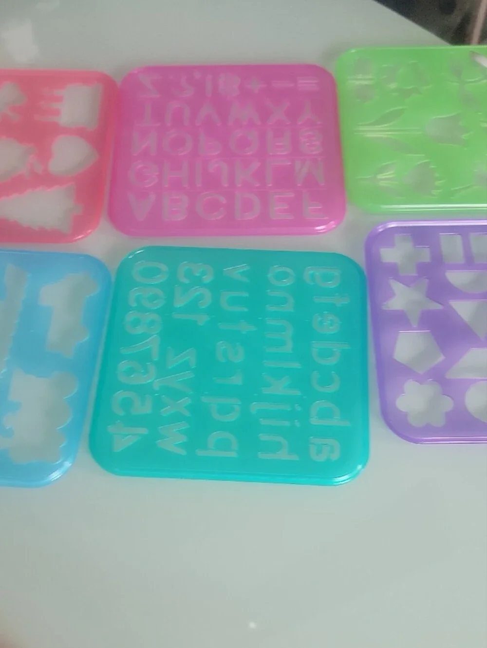 vintage Tupperware Tuppertoys Stencil Art templates from the late 80s.